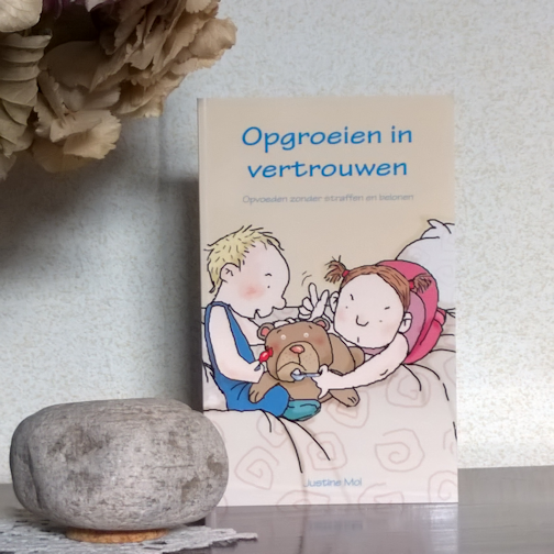 Opgroeien in vertrouwen : Opvoeden zonder straffen en belonen